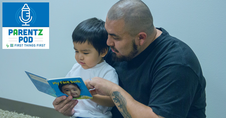 Father and toddler son reading together