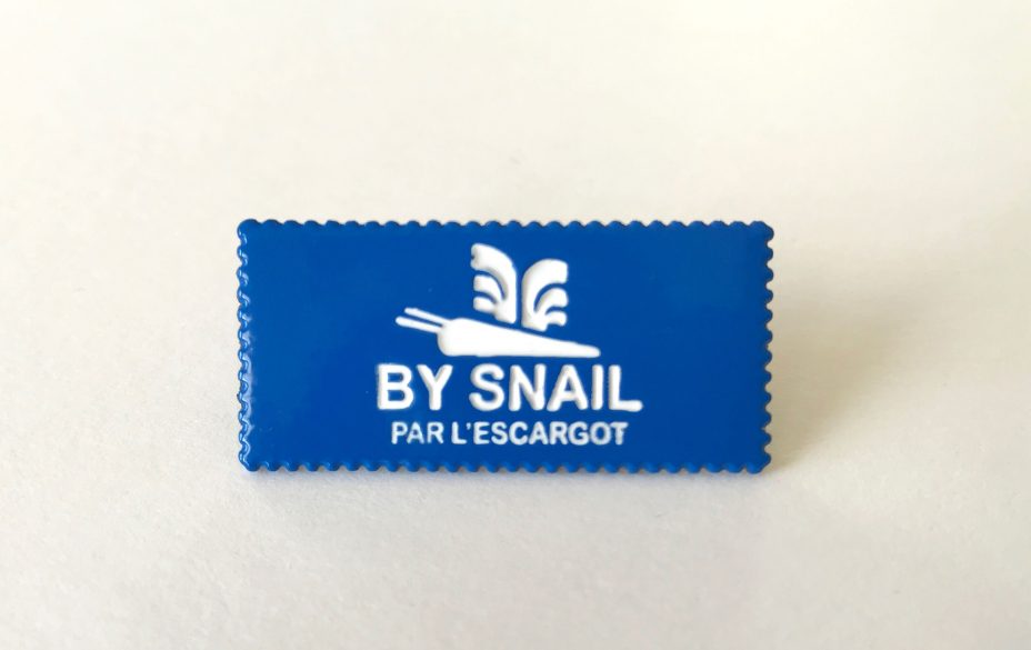 by snail enamel pin